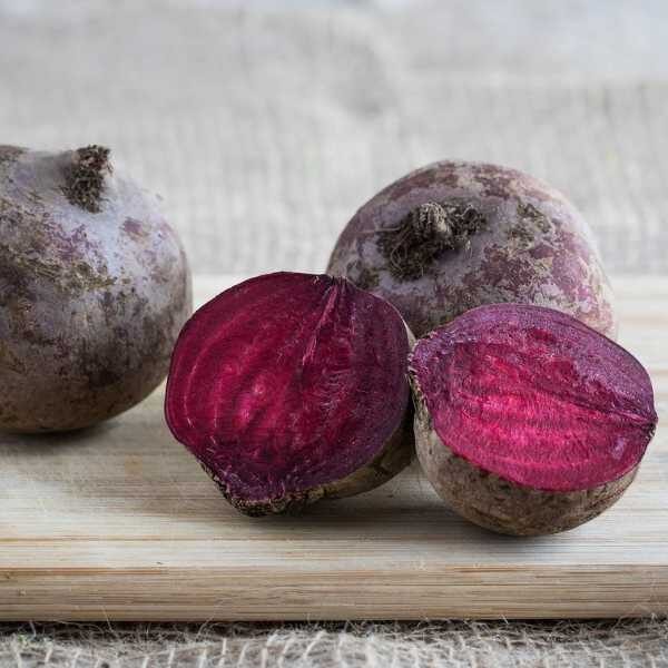 beetroot-bulls-blood-seeds four beetroot bulls blood on a chopping board