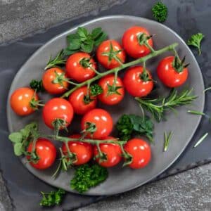 tomato sugar lump tomatoes on a plate on a wooden table